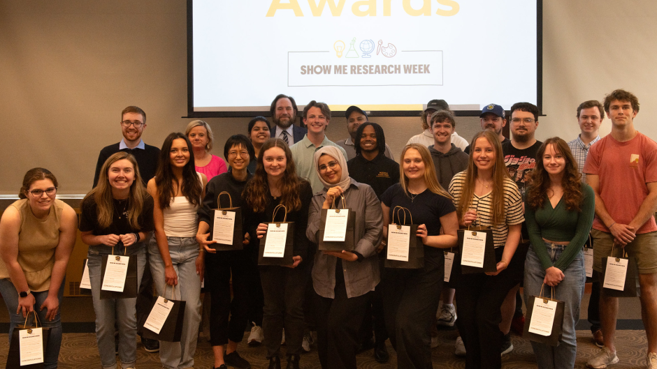 Group of students with awards