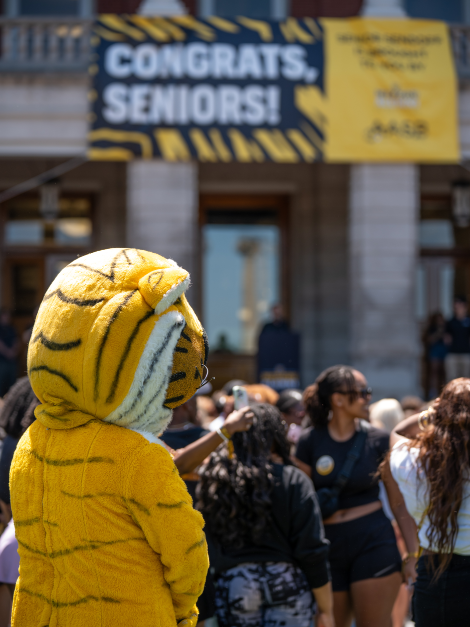 Truman the Tiger mascot with students